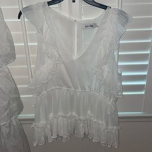 White ruffle blouse